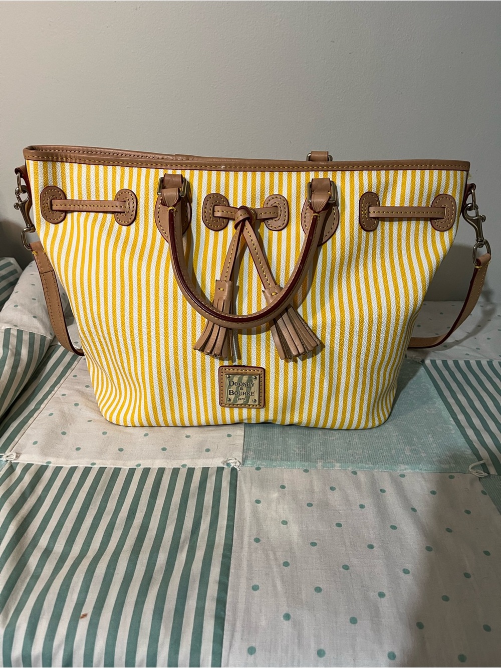 Dooney&Bourke Yellow and white striped coated canvas tote